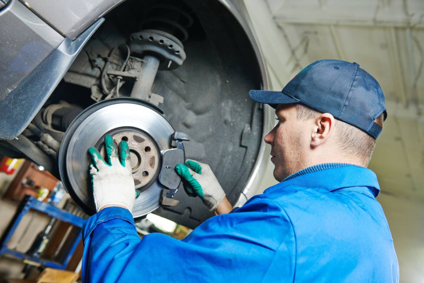 ASE certified technician performing brake repair in Fredericksburg VA