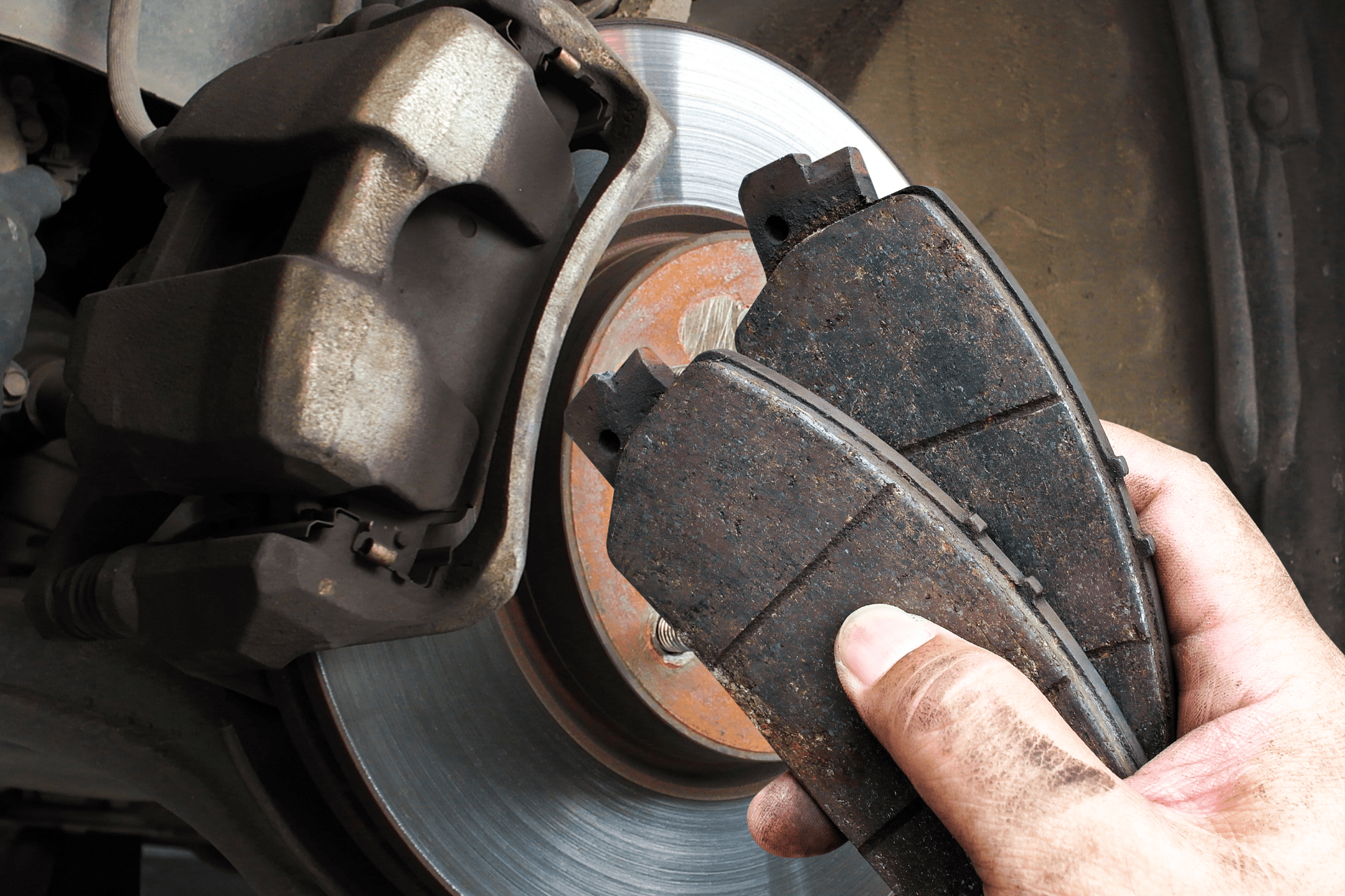 Brake rotor and caliper assembly during inspection in Fredericksburg VA